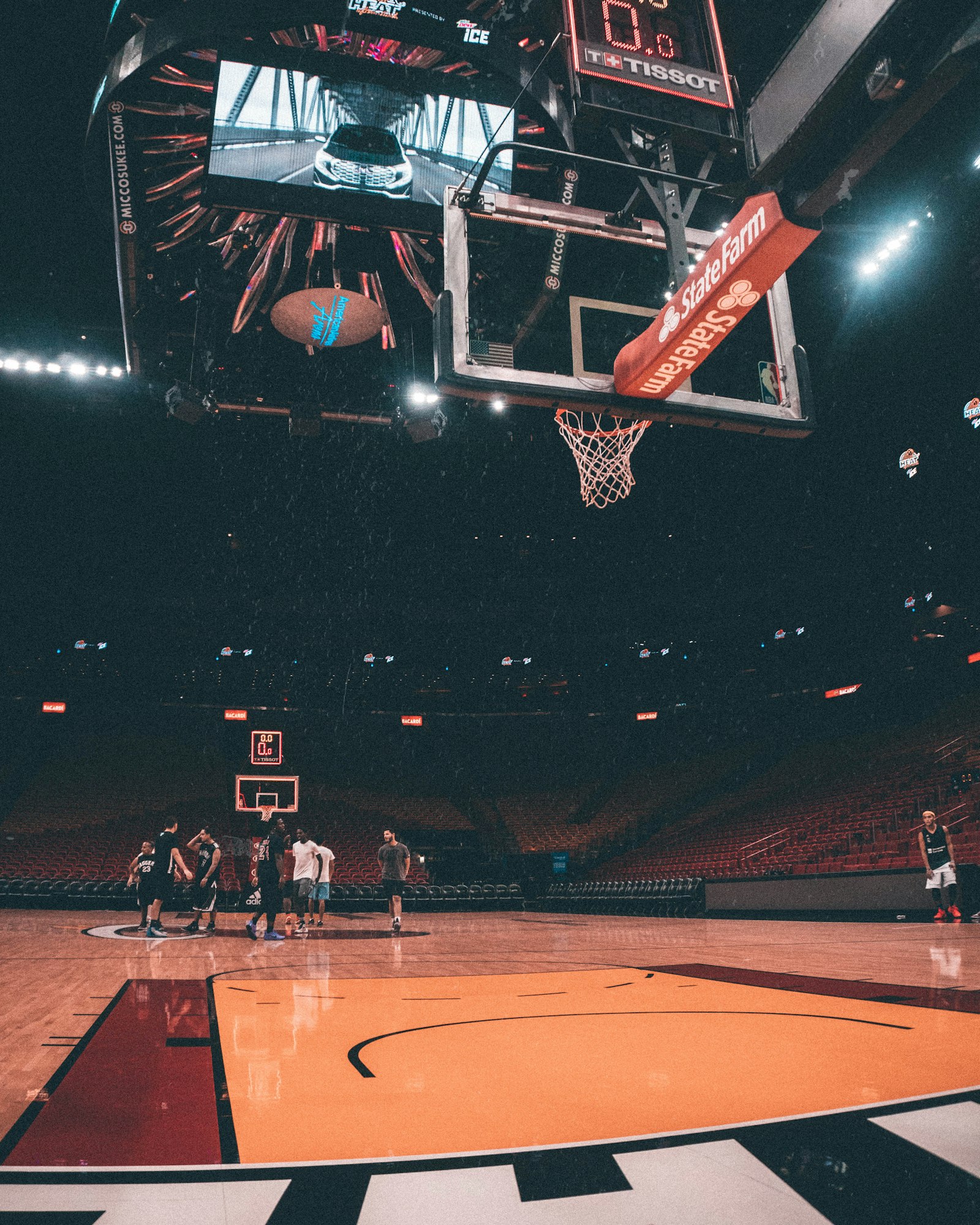 Basketball players mid-play